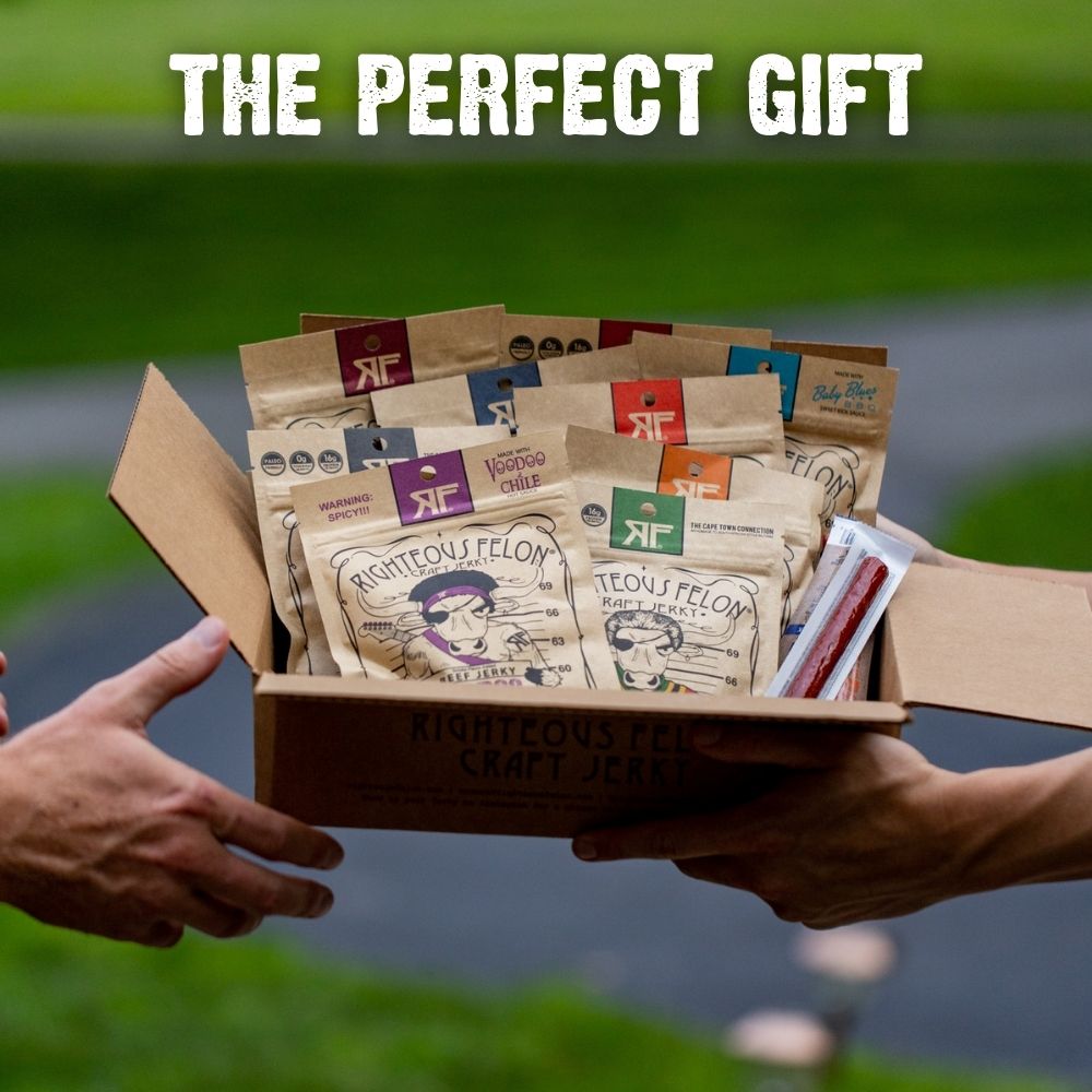 "The Perfect Gift", guys hands handing over box of jerky to friend