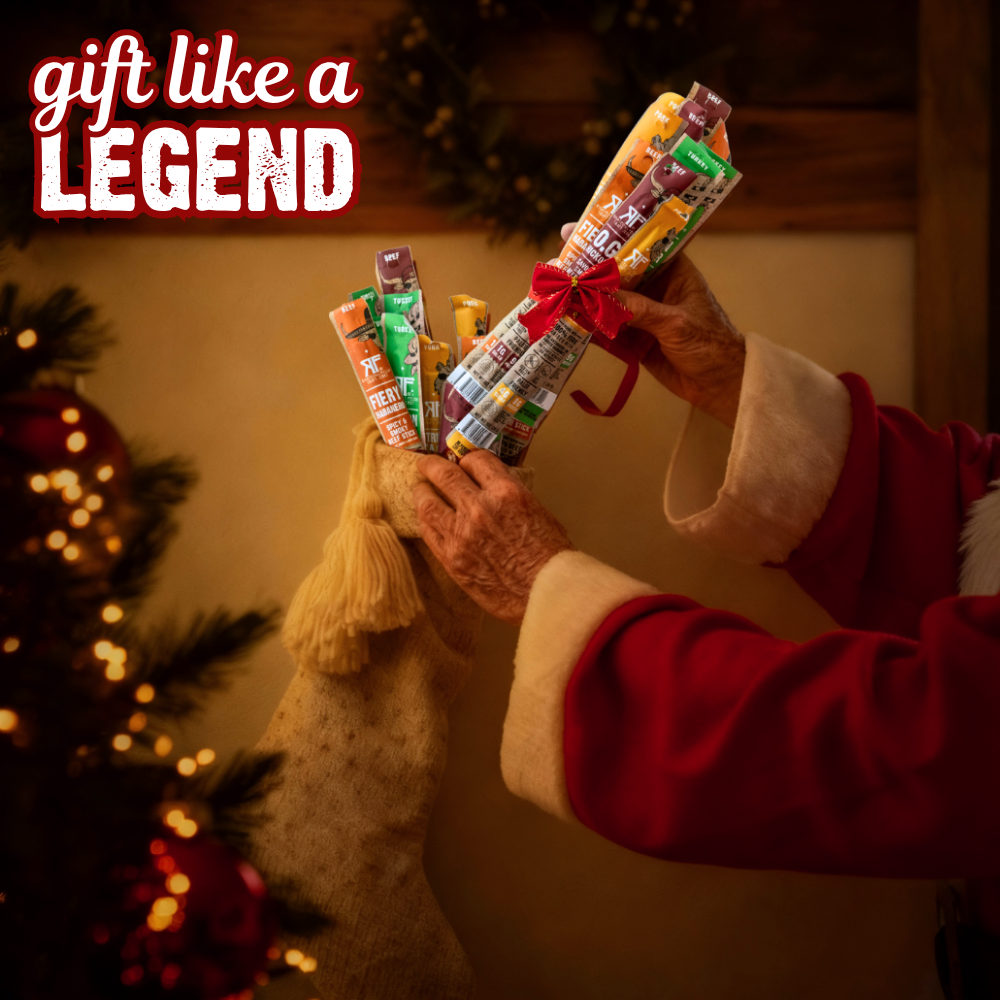 gift like a legend, Santa putting sticks in stocking